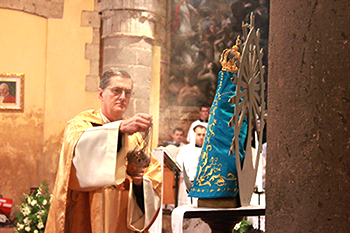 Fr. Carlos Walker and Our Lady of Lujan